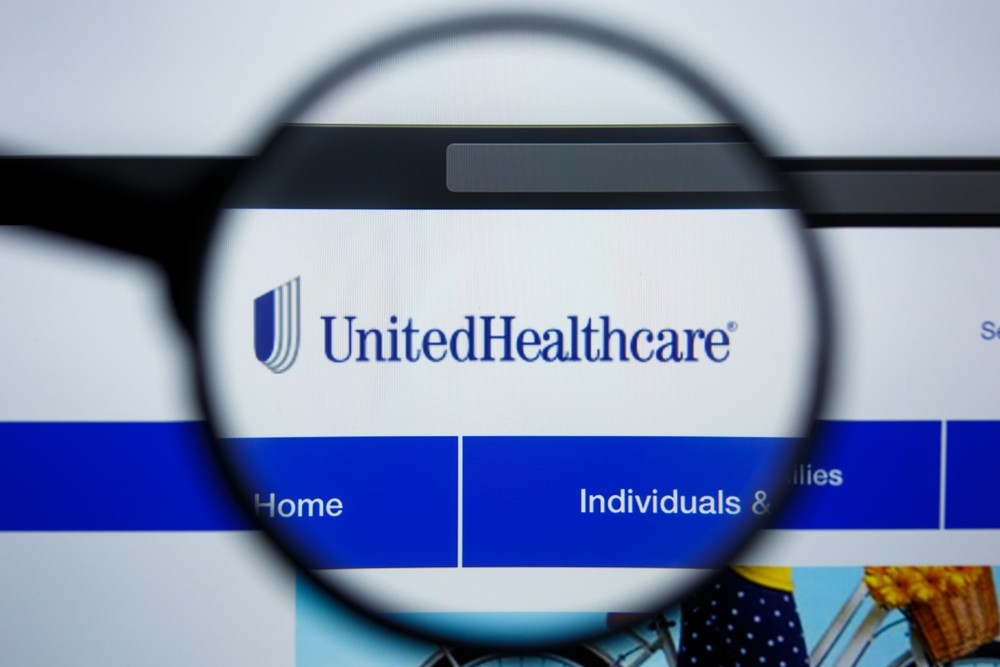 magnifying glass over UnitedHealthcare logo